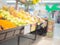 Fruit Department, Blurred shopping mall and retails store interior for background.