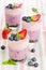 Fruit dessert with berries served in glass (berry cheesecake wit