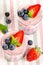 Fruit desserts with berries served in glasses (berry cheesecake