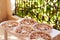 Fruit drying process on plates on balcony table