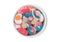 Fruit flavour gums candies with a sour sugar coating in ceramic bowl on white background