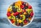 Fruit fresh mixed tropical fruit salad. Bowl of healthy fresh fruit salad - died and fitness concept