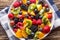 Fruit fresh mixed tropical fruit salad. Bowl of healthy fresh fruit salad - died and fitness concept