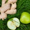 Fruit on grass, carrot apple ginger pumpkin fresh healthy food