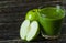 Fruit green smoothie in a transparent bowl apples and greens healthy food