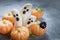 Fruit Halloween Treats. Banana Ghosts and Clementine Orange Pumpkins