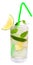 Fruit lemonade with lime and ice cubes and leaf mint in a highball glass