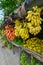 Fruit market by road. Tropical fruit bananas, tangerines, limes