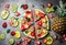 Fruit pizza. Watermelon mango, tuna and berries pizza. top view