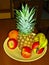 Fruit plate apples ananas banana orange pineaple