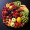 fruit plate with grapes, strawberries, apples, kiwi, pineapple