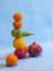 Fruit pyramid balance still life