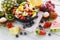 Fruit salad bowl fresh summer fruits and vegetables healthy organic food watermelon strawberries orange kiwi blueberries dragon