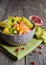 Fruit salad with kiwi, mango, mandarin, carambola and pomegranate