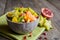 Fruit salad with kiwi, mango, mandarin, carambola and pomegranate