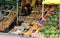 Fruit for sale, market stall, beautifully arranged fresh fruit on the market stall, watermelons, grapes and peaches