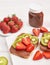 Fruit Sandwich, strawberries and kiwi. Peanut Butter Toast. Creative idea for kids breakfast, dessert or holiday meal, top view