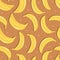 Fruit seamless pattern, bananas with shadow on light brown background. Summer vibrant design. Exotic tropical fruit