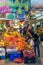 Fruit seller and buyers in the interior of the historical Bolhao Market