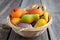 Fruit shaped candies in macro image of marzipan sweets in a bask