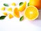 Fruit slices of oranges and green leaves, piece bright citrus.