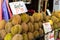 Fruit stall selling durian - yellow tropical fruit