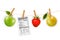 Fruit stickers and a nutrition label hanging on a rope.