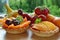 Fruit tart, mini baskets filled with fresh fruits