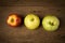 fruit traffic light concept. apple red. chinese pear yellow. guava green. on old wood