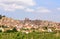 Fruit trees and the town of Calaceite, Teruel province, Aragon,