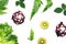 Fruit and vegetable background, Colorful pattern made of kiwi fruits, purple cabbage and green leaves.