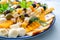Fruit and vegetable salads with olive, cheese and other ingredients