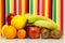 Fruits. Apple, pear, orange, grapefruit, mandarin, kiwi, banana. Multi-color background