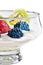 Fruits and berries in a glass bowl