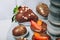 Fruits covered with chocolate decorated with puffed rice