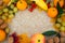 Fruits lie on a board of pressed straw