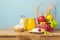 Fruits, milk and cheese on wooden table. Jewish Shavuot background