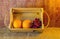 Fruits ( orange , grape ) in an wood box, on sack sisal background