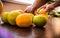 Fruits Orange lemon on table. Apple.