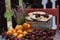 Fruits - peaches, cherries and a bouquet of lavender on the table on the terrace