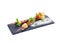 Fruits pieces mix on skewer. Isolated.