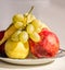 FRUITS PLATTER from apple, banana, pomegranate and grapes.