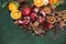 Fruits pomegranate orange spices ingredients rustic background