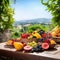 Fruits on the table. View on the mountains from patio on a beautiful sunny day