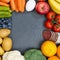 Fruits and vegetables food collection frame square slate copyspace from above