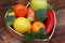 Fruits and Vegetables in Heart shaped Wooden Box. Broccoli, apples, Pepper, tangerine over Wooden Background. Banner. Health food