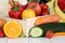 Fruits and vegetables like oranges, apple in wooden box