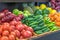 Fruits and vegetables on the market tray are fresh and tasty. persimmon, citrus, oranges.