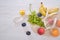 fruits and vegetables in mesh bag on a wooden background copy space top view, eco friendly life style concept