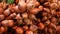 Fruits and vegetables on rustic stall. Assorted fresh ripe fruits and vegetables placed on rustic oriental stall in market. Red